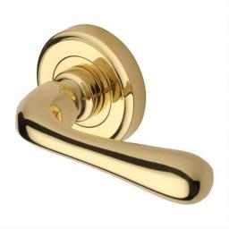 Heritage Brass Door Handle Lever Latch on Round Rose Charlbury Design Polished Brass finish.jpg