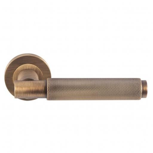 Varese - Knurled Lever on Rose in Antique Brass