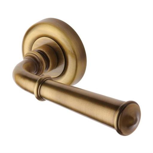 colonial lever handle antique brass v1932at
