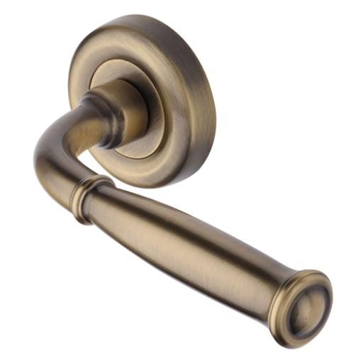 Lincoln Lever on Round Rose Antique Brass