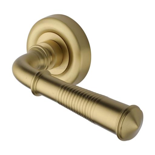 Colonial Reeded Lever on Rose Satin Brass Heritage Brass