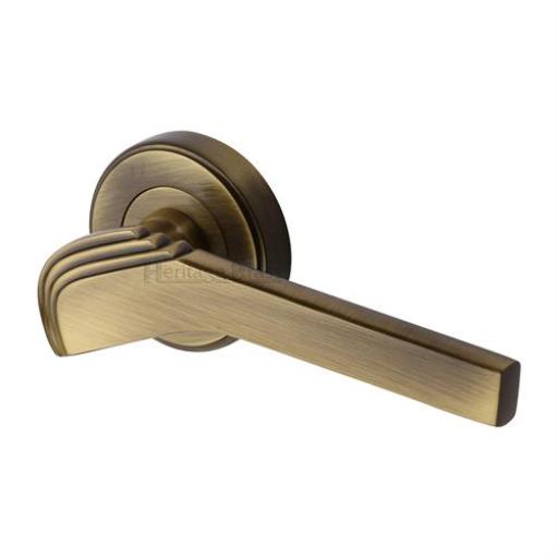 RR3022-AT - Heritage Brass Door Handle Lever Latch on Round Rose Charlbury  Reeded Design Antique Brass finish - Brass Lever Handles on Round Rose