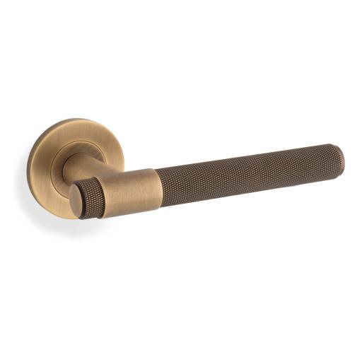 Kingston Knurled Lever on Rose  In Antique Brass